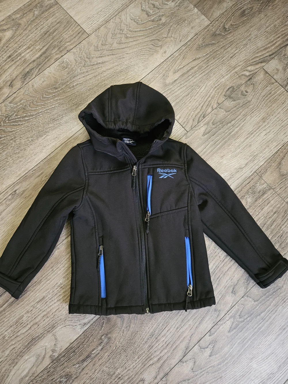 Reebok Kids Black Hooded Jacket with Blue Trim